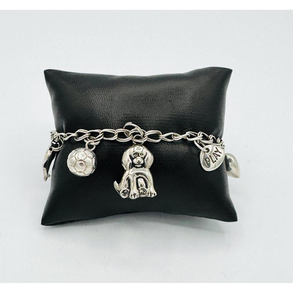 Sterling silver double rolo chain with 7 charms bracelet